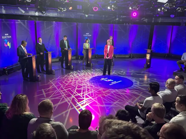 The five politicians are standing in the studio ahead of broadcast