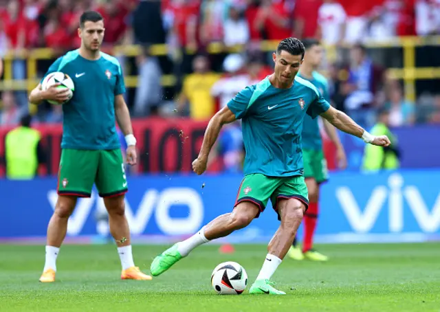 Cristiano Ronaldo of Portugal shoots as he warms up