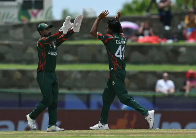 Tanzim Hasan celebrates a wicket