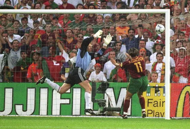 Sergio Conceicao scoring past German goalkeeper Oliver Kahn