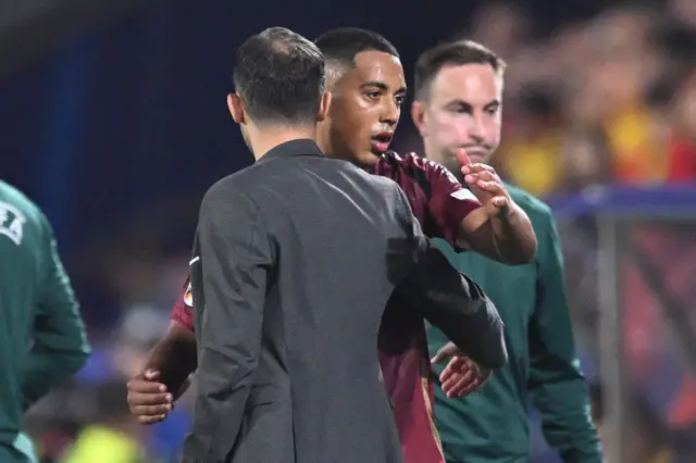 Tielemans embraces Tedesco as he comes off the pitch