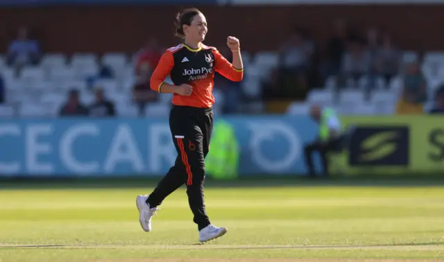 Heather Graham celebrates taking the wicket of Phoebe Franklin