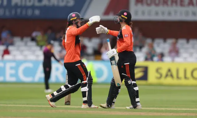 Ella Claridge and Josie Groves of The Blaze celebrating after beating the Central Sparks