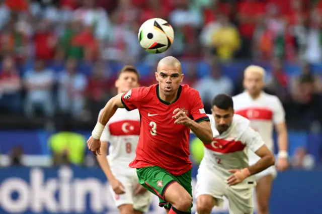 Pepe charges up field with the ball