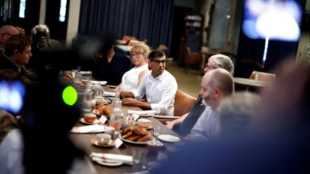 Rishi Sunak eats at a diner with night-time economy representatives.