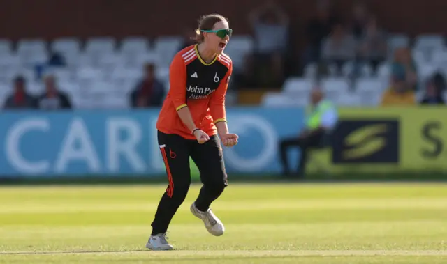 Kirstie Gordon celebrates taking the wicket of Bryony Smith