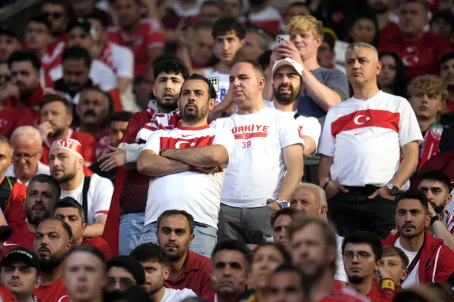 Turkey fans watch on in disbelief and disappointment