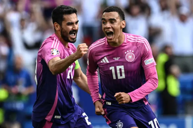 Ilkay Gundogan and Jamal Musiala celebrate