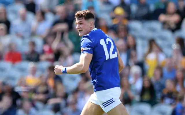 : Kevin Swayne celebrates after scoring his side's second goal of the match