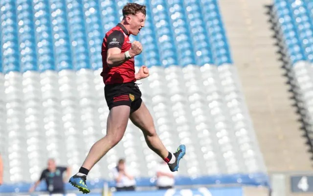 Ryan McEvoy celebrates scoring the point that takes the game to extra time