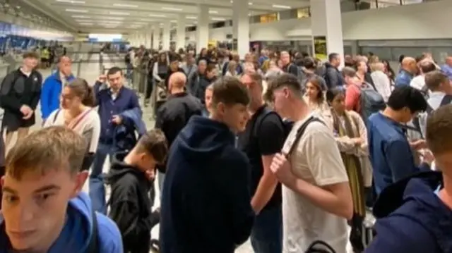 Queues at Manchester Airport at 5am Sunday