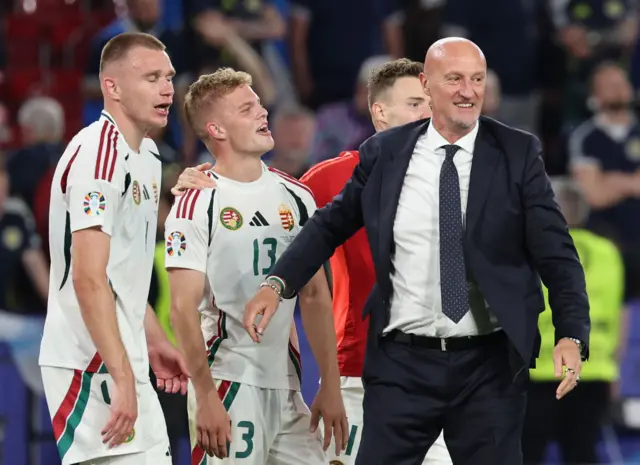 Marco Rossi celebrates with his players at full-time