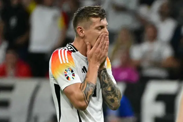 Kroos reacts to a missed shot