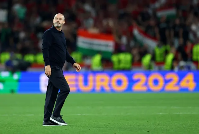 Steve Clarke stares up at the Scotland fans after the game