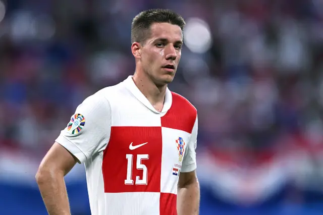 Mario Pasalic of Croatia looks on