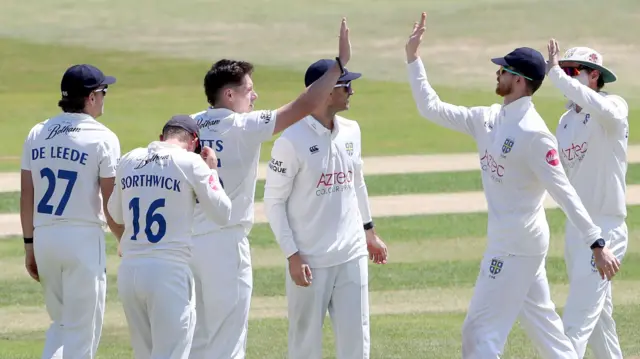 Matthew Potts takes a wicket