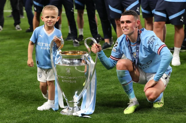 Phil Foden and his son