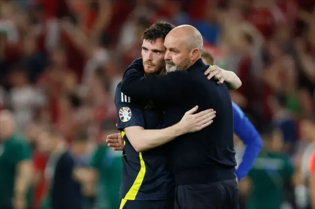 Andy Robertson hugs Steve Clarke