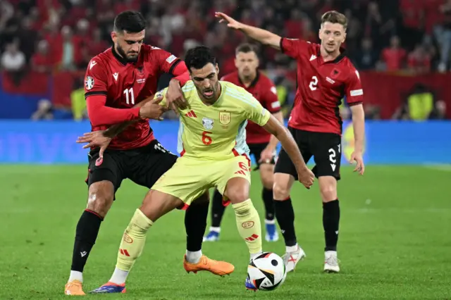 Albania's forward #11 Armando Broja fights for the ball with Spain's midfielder #06 Mikel Merino