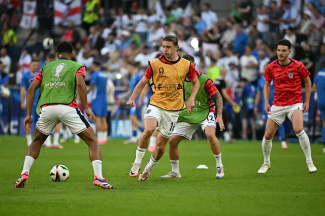 Gallagher tries to intercept the ball in the warm up