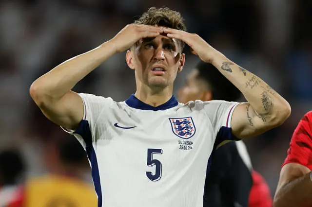 John Stones of England reacts