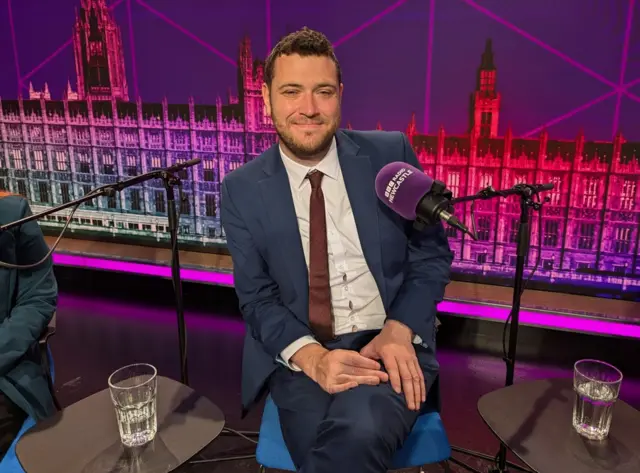 Labour candidate Joe Morris sat in the studio in front of a microphone