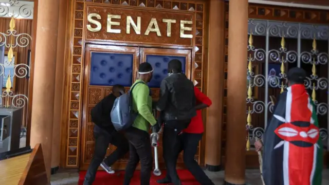 Demonstrators breach into Parliament during a protest against tax hikes in Nairobi, Kenya, 25 June 2024.