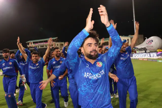 Rashid Khan leads Afghanistan players on lap of honour after win over Bangladesh