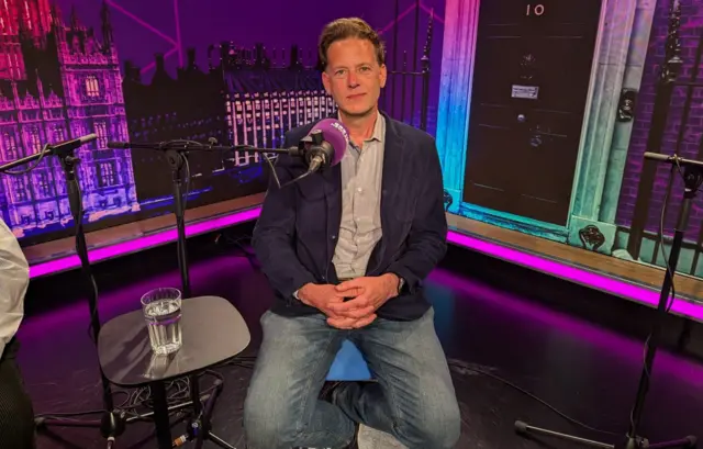 Reform UK candidate Andrew Husband sat in the studio with a microphone in front of him