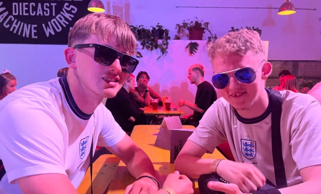 England fans, James Woods and Matthew pose with sunglasses on