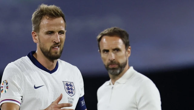 Harry Kane with Gareth Southgate in the background