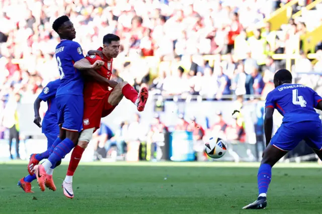 Poland's forward Robert Lewandowski in action