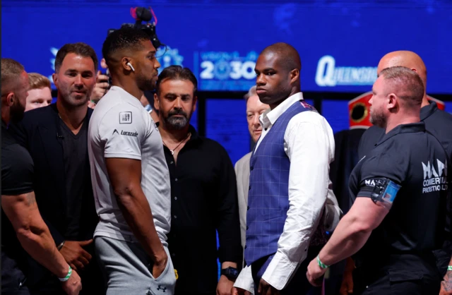 Daniel Dubois looks away during a face-off with Anthony Joshua