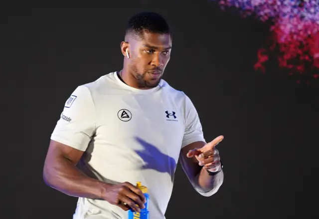 Anthony Joshua in a grey tshirt