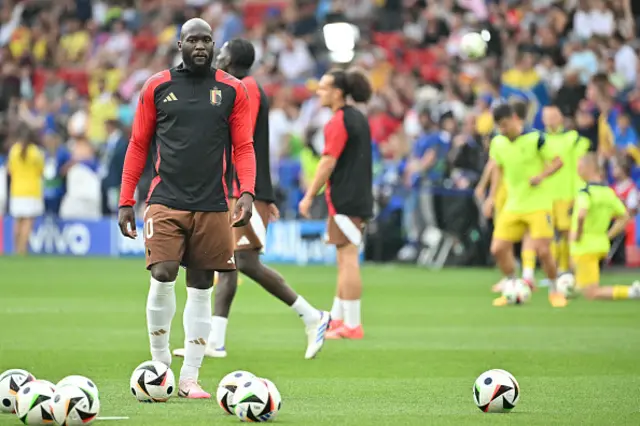 Romelu Lukaku warms up