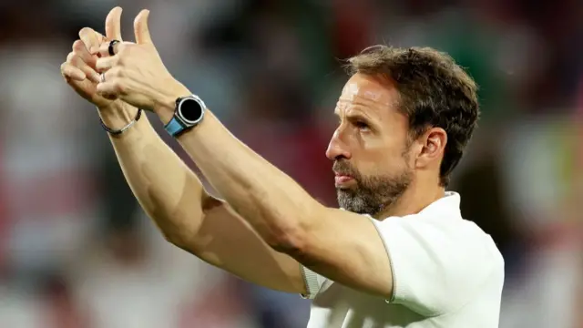 England manager Gareth Southgate (Side profile)  during the Euro's in Germany.  He is gesturing to the crowd displaying a thumbs up with both hands.