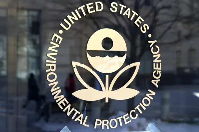 The U.S. Environmental Protection Agency's (EPA) logo is displayed on a door at its headquarters