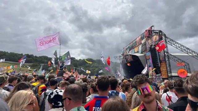 Concert goers crowd around the main stage to catch a glimpse of Barry Can't Swim.