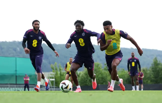 England's Kobbie Mainoo, Joe Gomez and OIlie Watkins in training