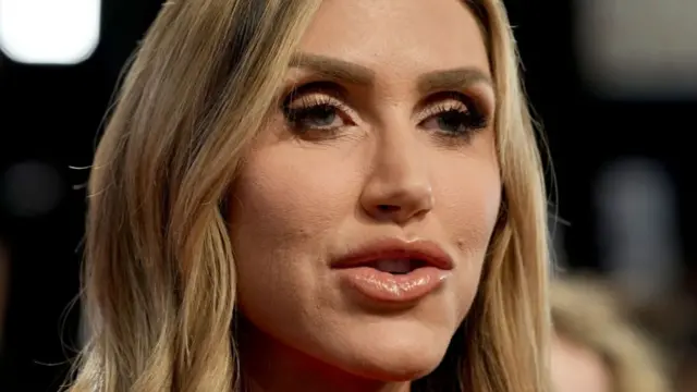 Lara Trump, co-chair of the Republican National Committee speaks to reporters in the spin room following the CNN Presidential Debate