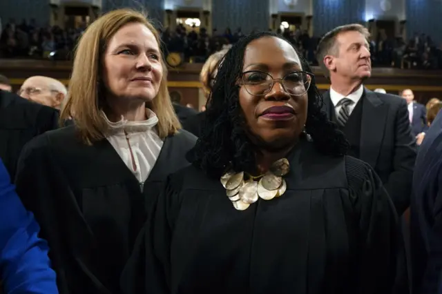 Amy Coney Barrett, associate justice of the US Supreme Court, left, and Ketanji Brown Jackson, associate justice of the US Supreme Court, following a State of the Union address at the US Capitol in Washington, DC, US, on Tuesday, Feb. 7, 2023.