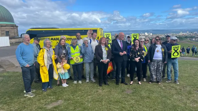 John Swinney with campaigners