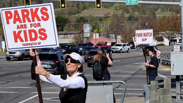 A group of Grants Pass residents called Park Watch demonstrate to raise awareness of the ill effects of homeless people camping in city parks, in Grants Pass, Oregon, U.S., April 17, 2024