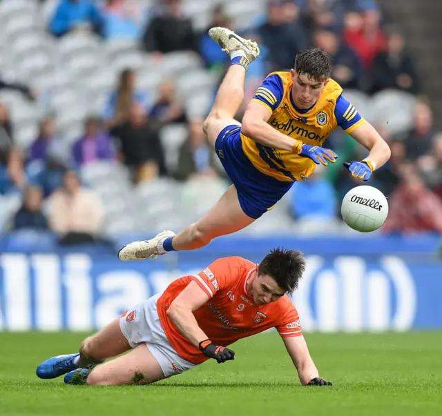 Daire Cregg of Roscommon in action against Ben Crealey of Armagh