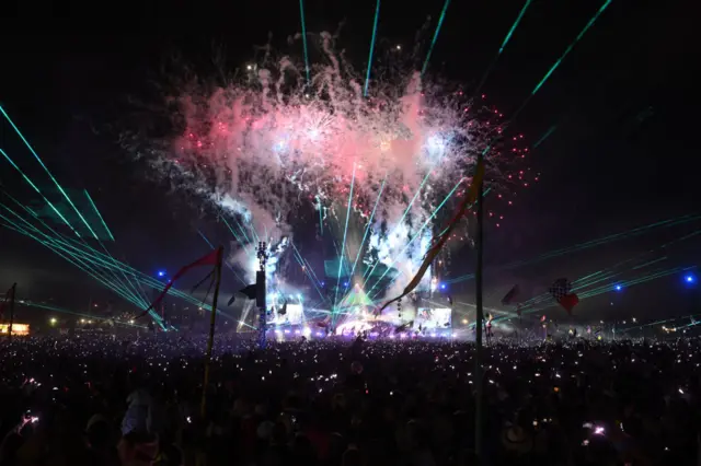 Fireworks explode at the Coldplay concert at Glastonbury