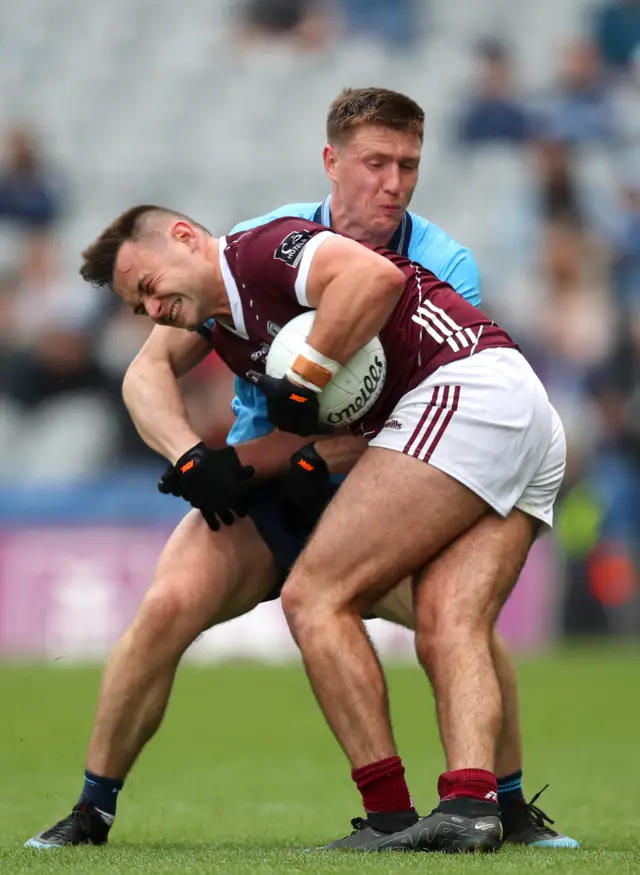 Dublin's John Small tackles Cillian McDaid