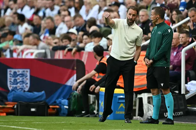 Gareth Southgate talks to the fourth official