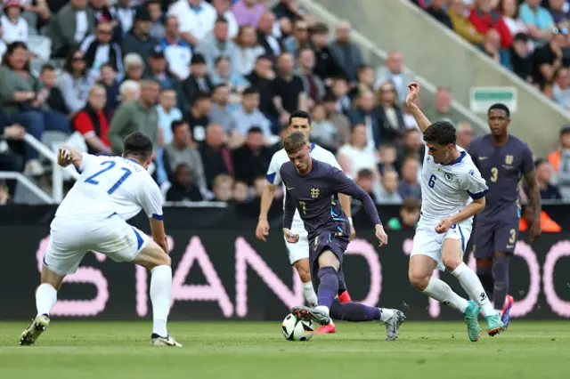 Cole Palmer of England battles for possession with Benjamin Tahirovic