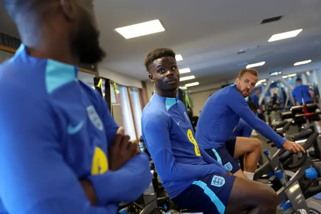 Bukayo Saka and Harry Kane on exercise bikes during England's training camp