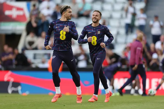 Jack Grealish and James Maddison of England warm up